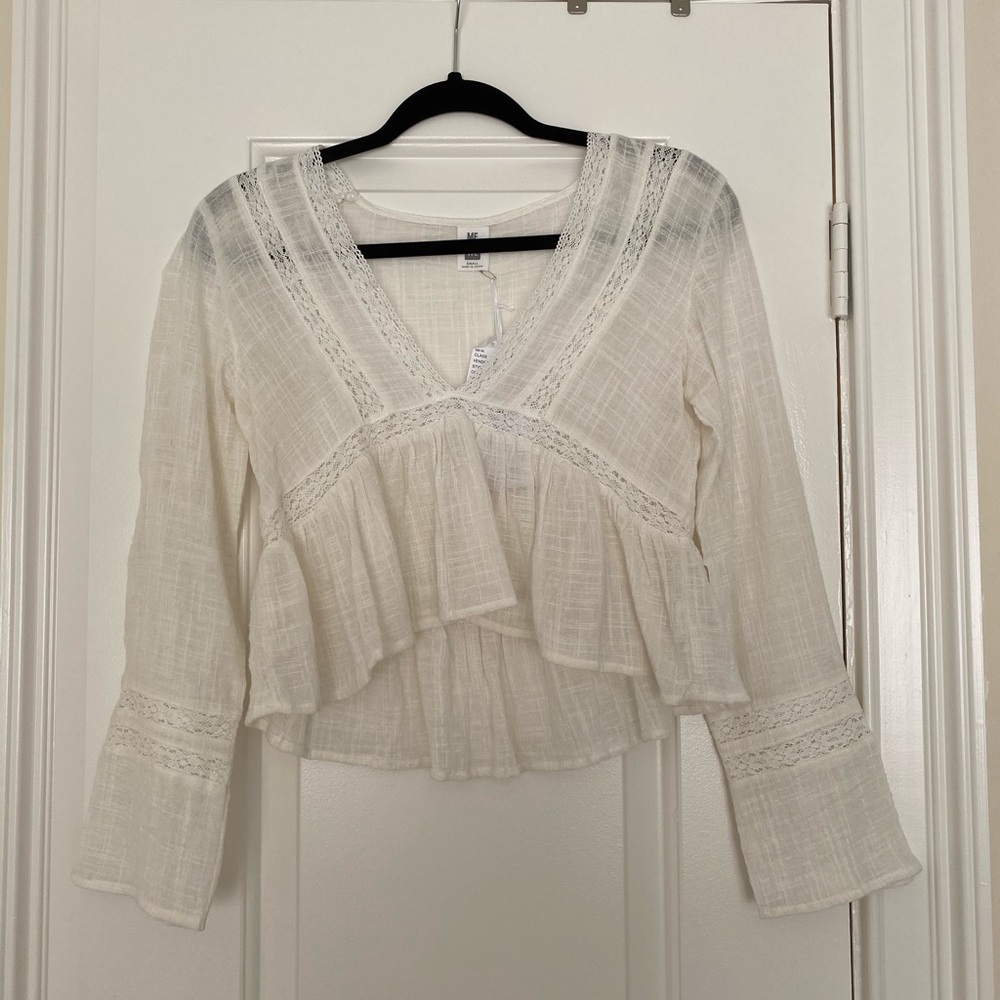 Me to We Long Sleeved top.